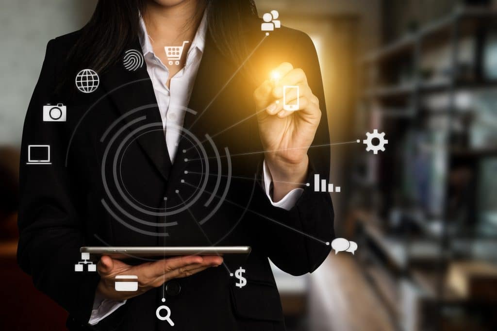 Businesswoman with tablet containing 5 digital marketing strategies proven to grow your business