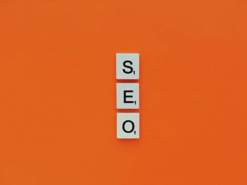 SEO scrabble letters on an orange background