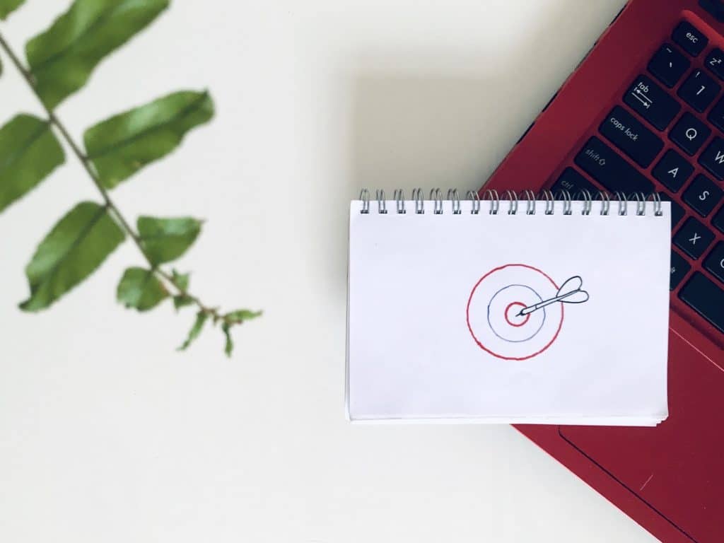 target audience drawing on desk background